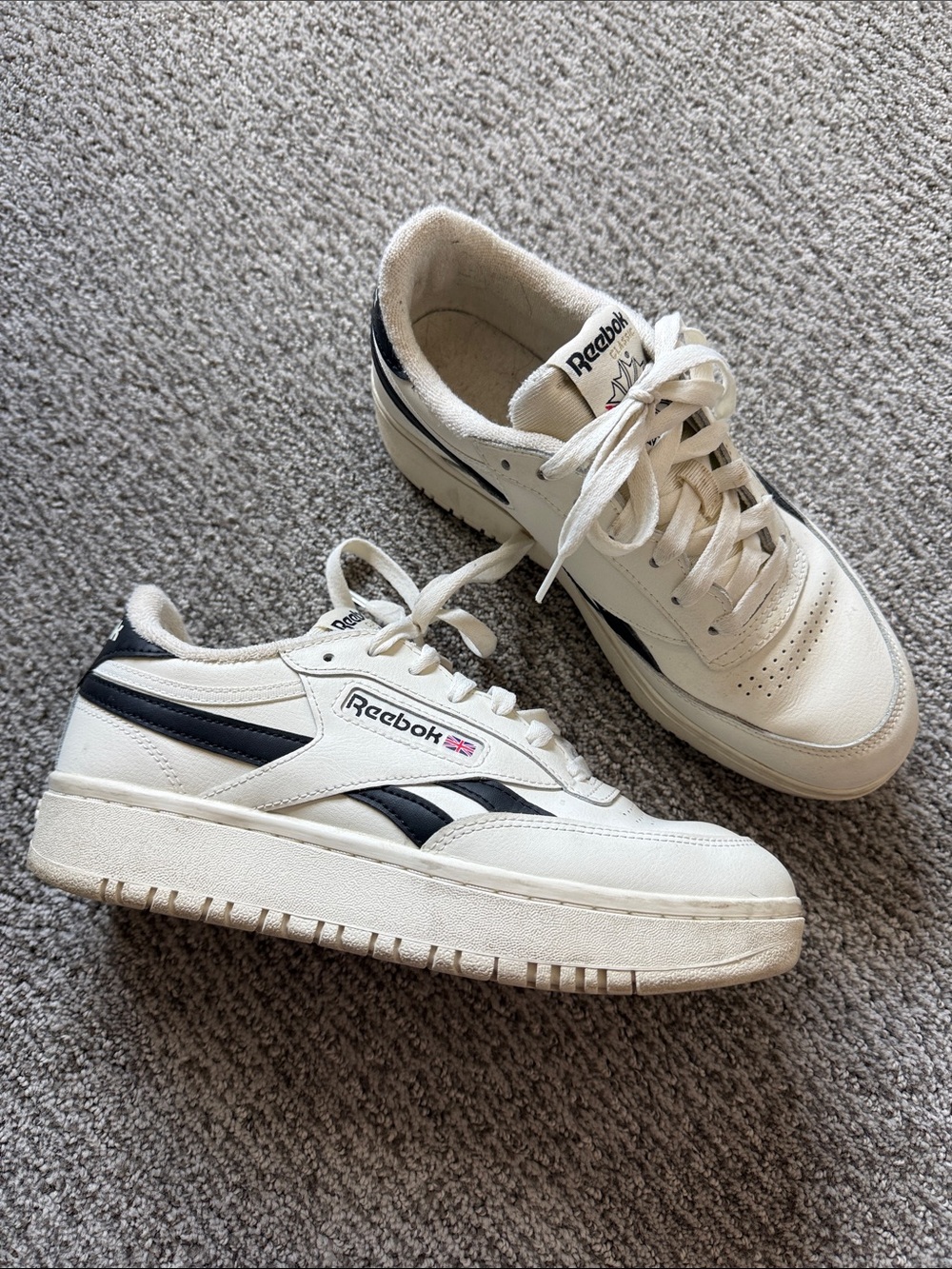 Reebok White Leather Sneakers with Black Stripes